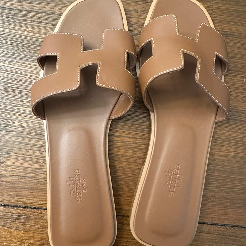 Hermes Tan Sandals
Have both styles 
Price is for individual item